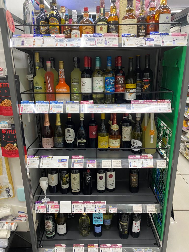 GS25 convenience store interior in Seoul with Korean product shelves