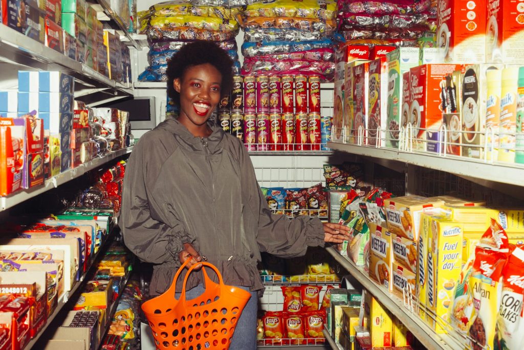 Bright interior of a Korean convenience store with colorful snack shelves