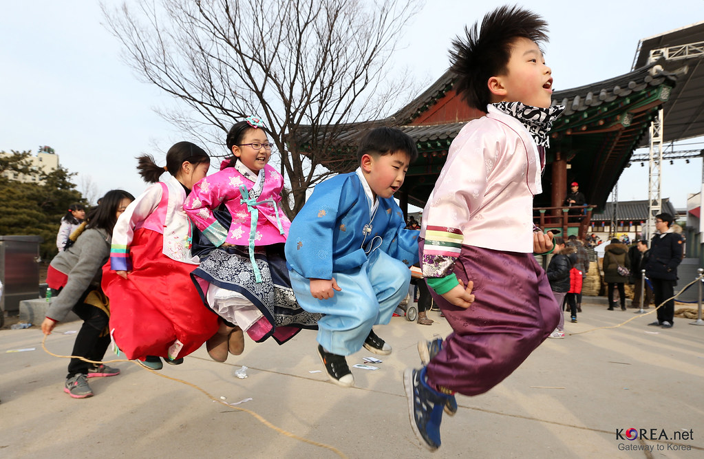 Children in hanbok at a folk event at Namsangol Hanok Village