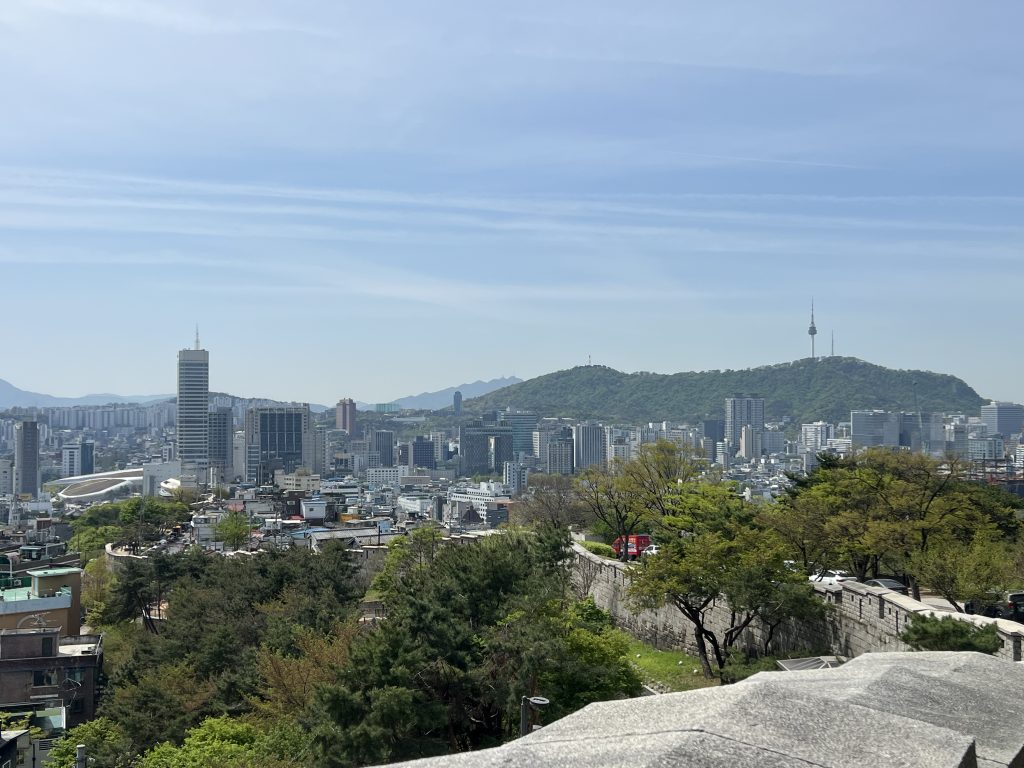 Panoramic view from Naksan Park over the Seoul City Wall toward N Seoul Tower and the city