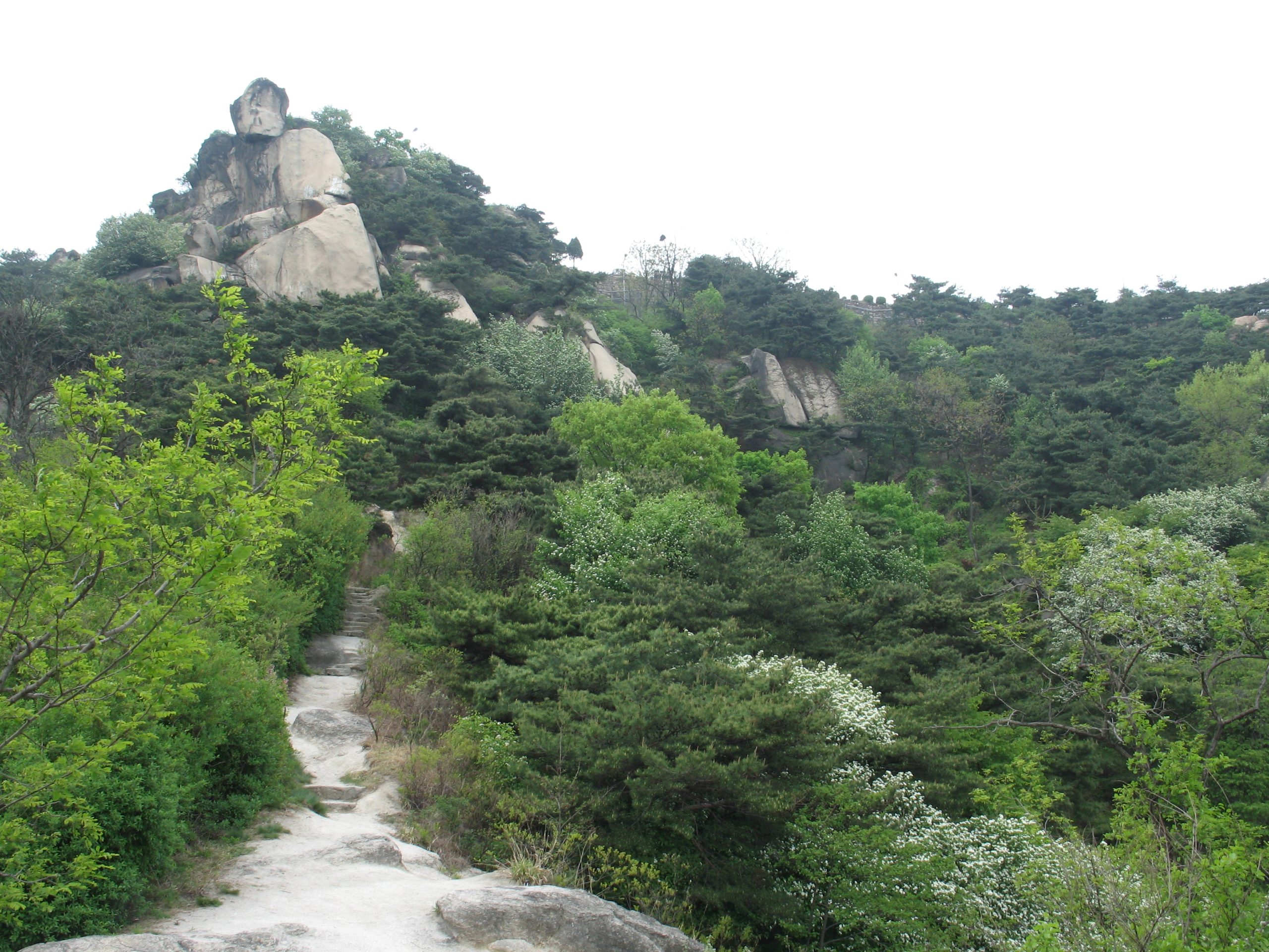 Granite peak of Inwangsan with a stone trail to the summit