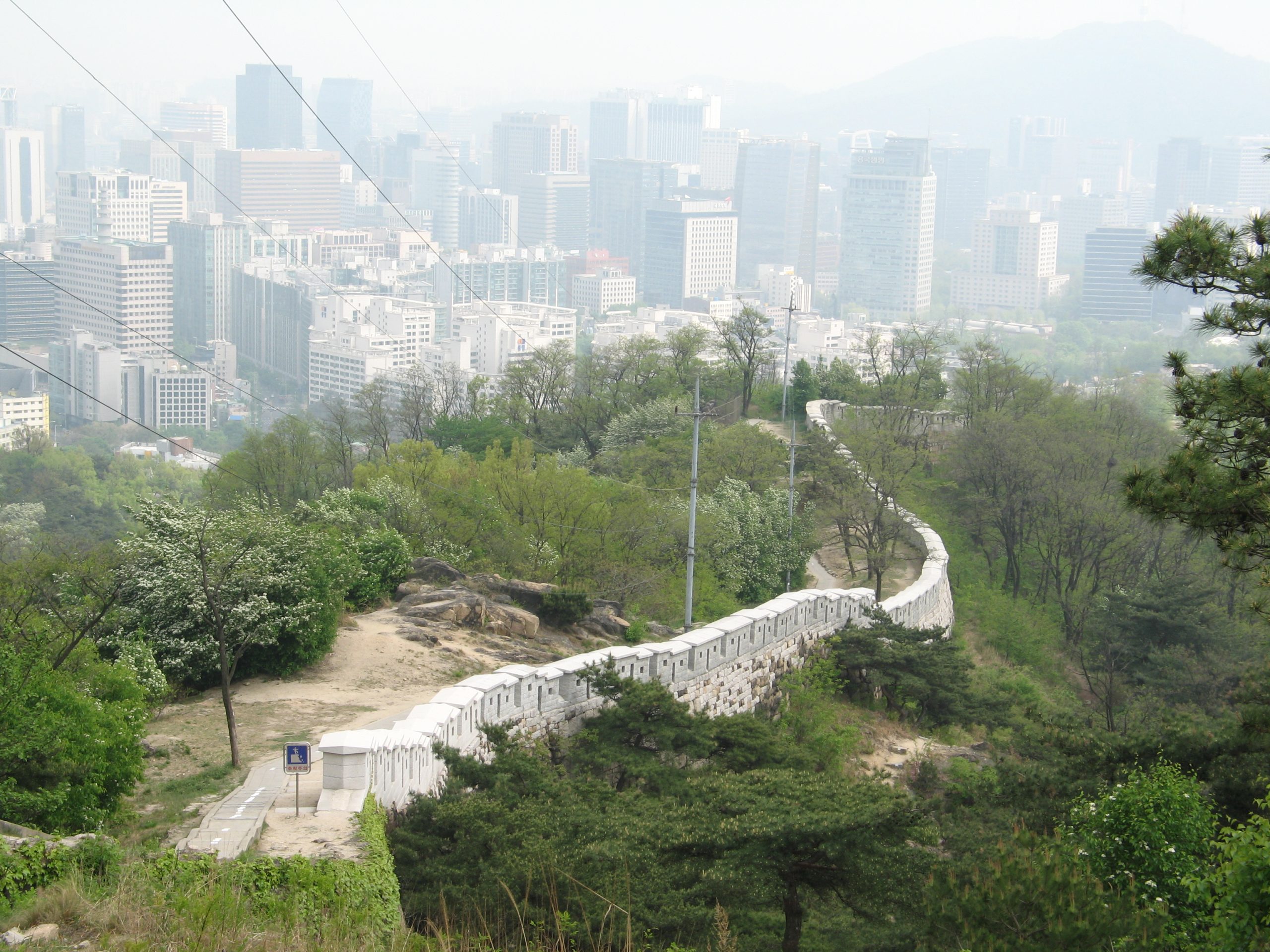 Seoul City Wall running down the Inwangsan ridge above downtown
