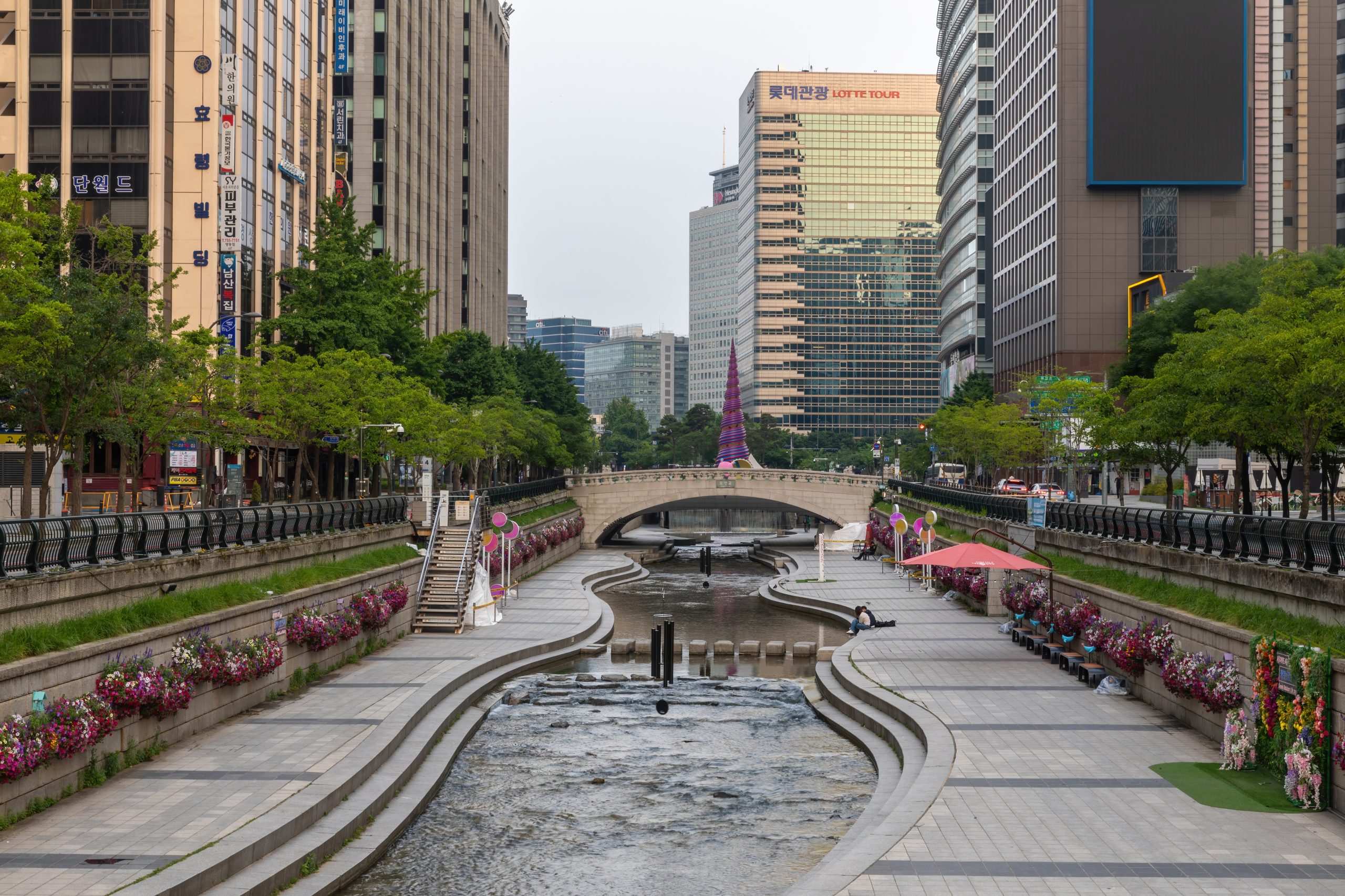 Cheonggyecheon Stream and the Spring sculpture at Cheonggye Plaza, downtown Seoul