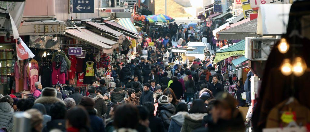 Crowds packing the Namdaemun Market alleys before Seollal in Seoul