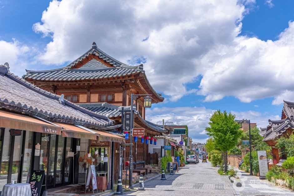 Jeonju Hanok Village hanok street with tiled roofs and blue sky