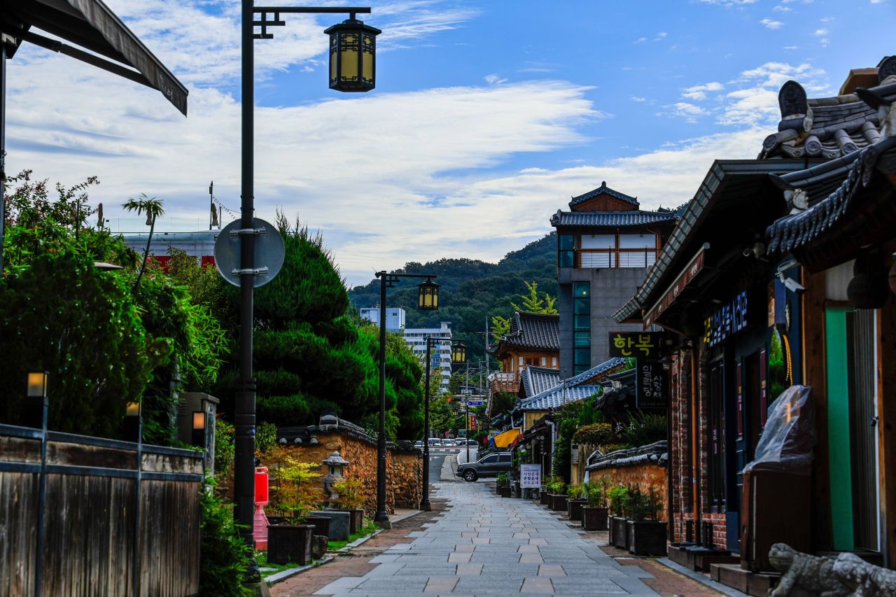 Early-morning lane in Jeonju Hanok Village with hanok houses