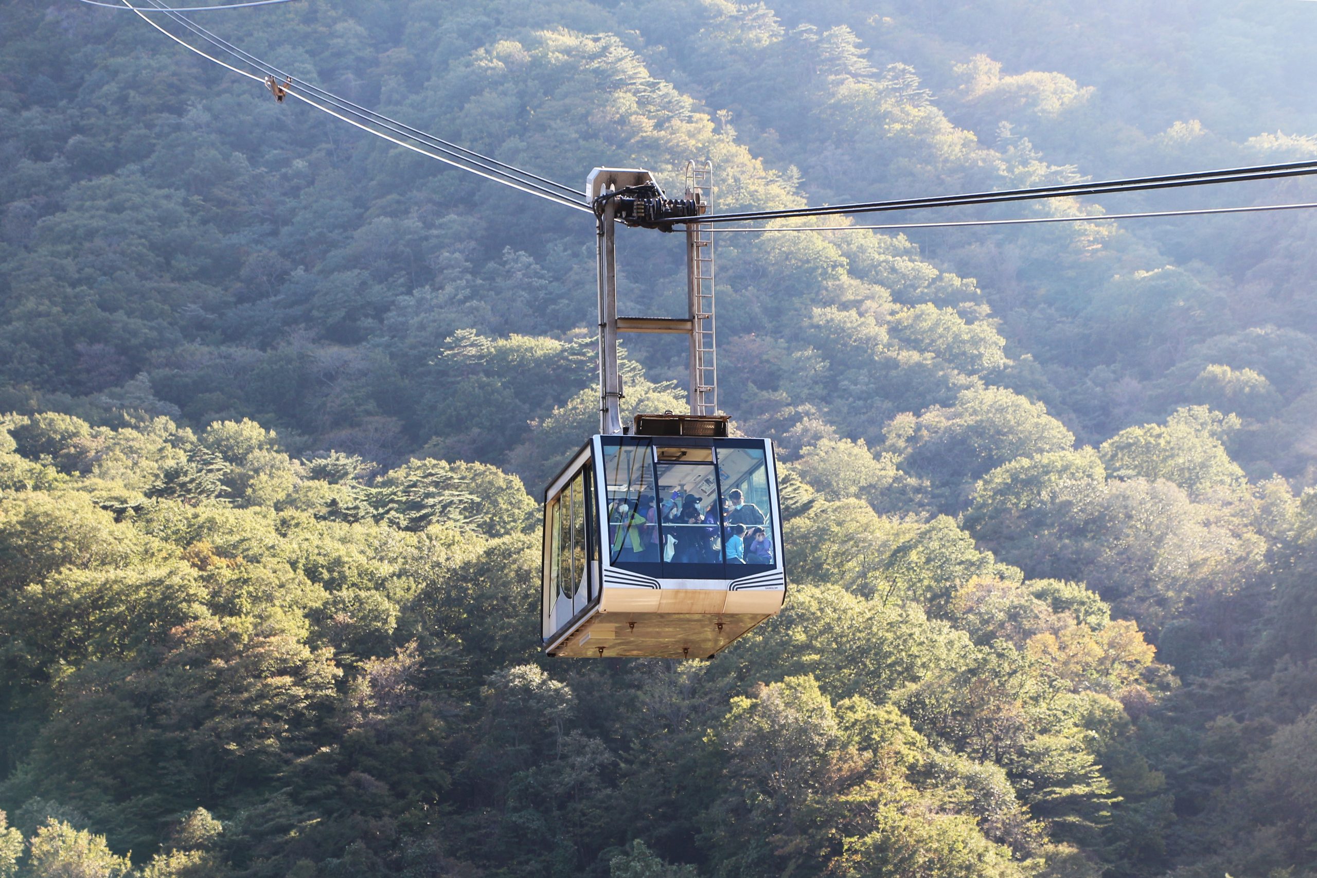 Seorak cable car cabin crossing forest in Seoraksan National Park