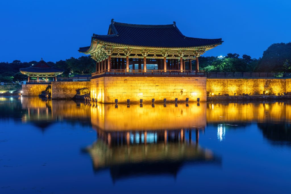 Donggung Palace reflected in Wolji Pond at blue hour in Gyeongju